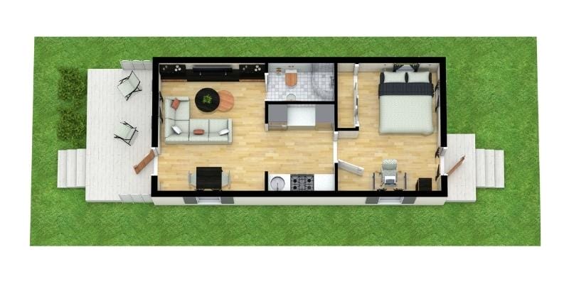 3D floor plan of a compact single-story shotgun-style house with a front porch leading into an open living room and kitchen area. The middle section includes a bathroom and laundry space, while the rear features a bedroom with a desk area and access to a small back porch. The layout has light wood flooring throughout.