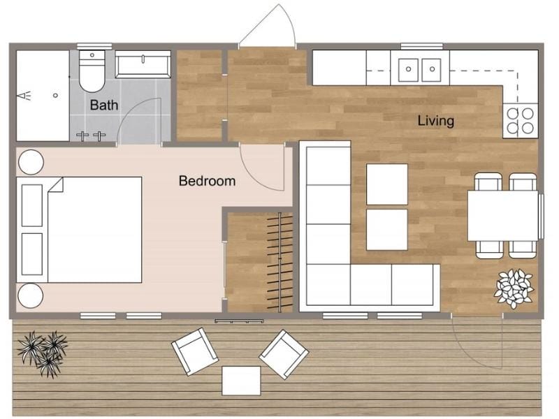 2D floor plan of a one-bedroom apartment with an open living, dining, and kitchen area, a separate bedroom, bathroom, and a large outdoor deck with seating.