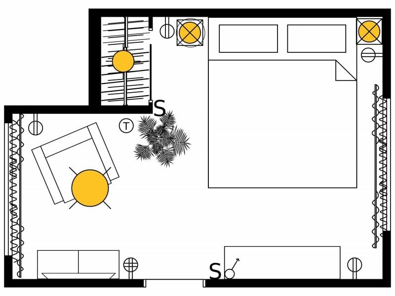 Electrical plan for a bedroom showing lighting fixtures, switches, and outlets placed around the bed, seating area, and walls using standard electrical symbols.