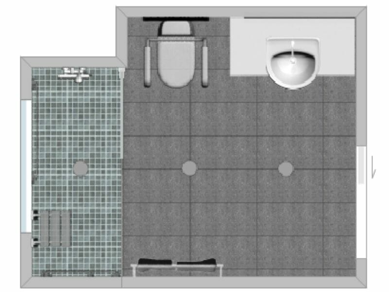 Top-down floor plan of a senior-accessible bathroom featuring a walk-in shower with non-slip mosaic tiles and a fold-down seat, a toilet with side grab bars, and a sink with clear knee space. The bathroom has wide circulation space for wheelchair access and is fitted with large, slip-resistant floor tiles.